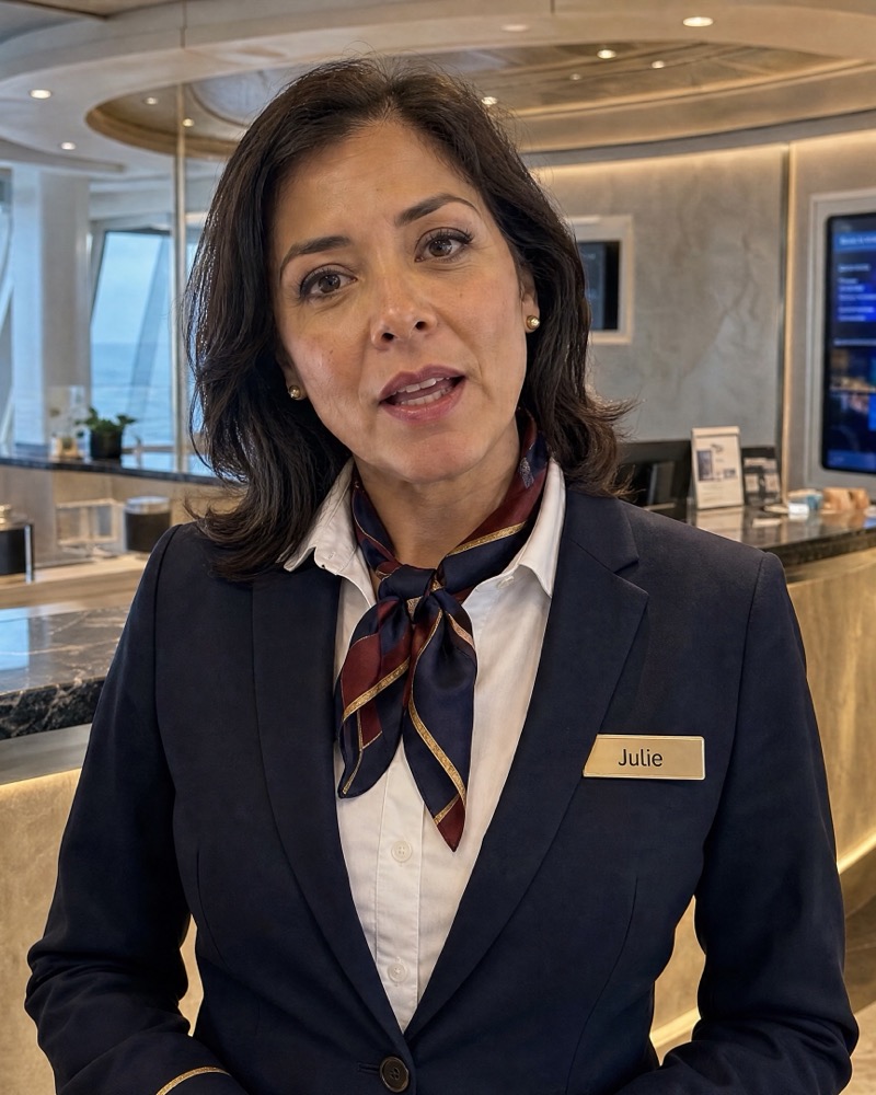 Julie G. at the guest services desk